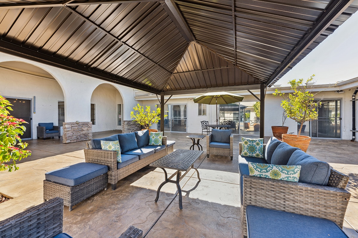 the courtyard and shaded soft seating of Villa Las Palmas