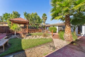 the courtyard and walking paths of Villa Las Palmas