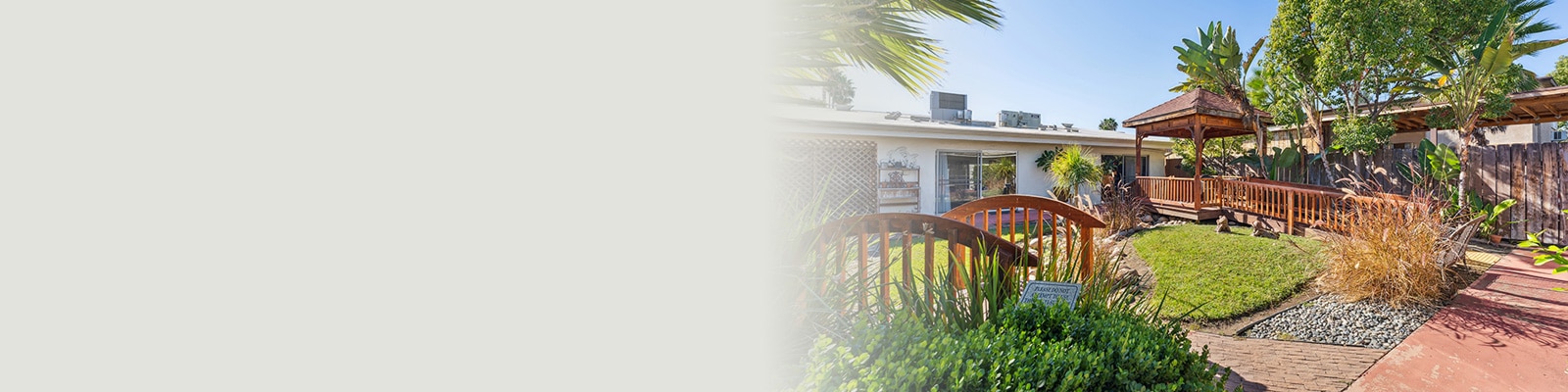 the courtyard and walking paths of Villa Las Palmas